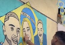 Veja Vídeo – Comunidade transforma asfalto em arte e eterniza influenciadores em rua de Cuiabá